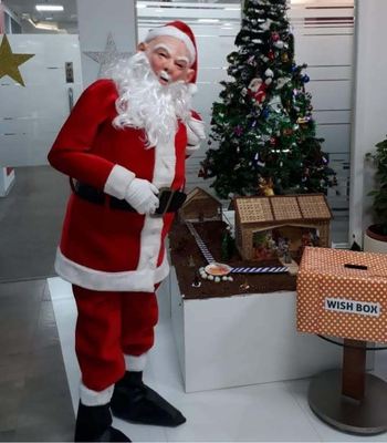 Santa Claus Mascot at a corporate event for Christmas celebration