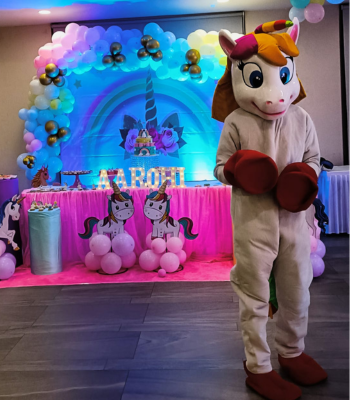 Unicorn mascot playing with kids at a corporate event